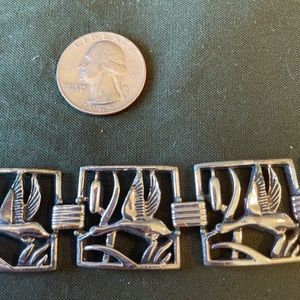 Crane design bracelet.